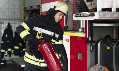 male-firefighter-station-equipped-with-suit-safety-helmet